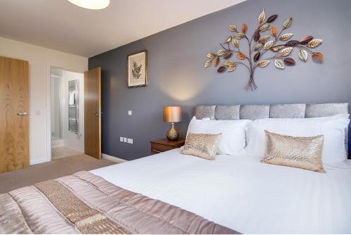 Ένα ή περισσότερα κρεβάτια σε δωμάτιο στο Mica Point City Centre Apartment