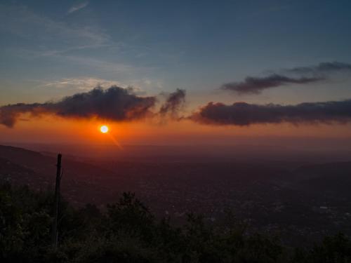 a view of the sunset from the top of a hill at Domaine du Bois d'Amont in Cabris