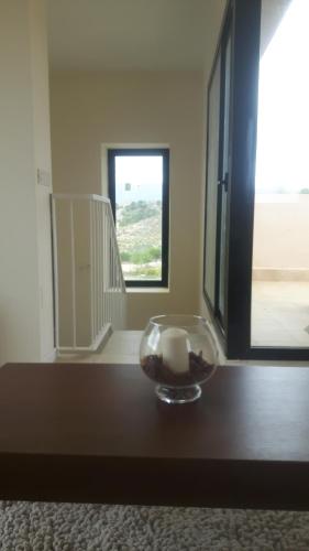 a bowl on a table in a room with a window at Casa Patrick in Murcia
