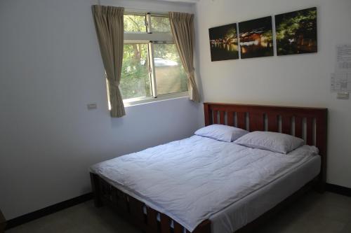 Shan Hu Lian Homestayにあるベッド