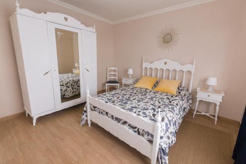 Кровать или кровати в номере Casa da Maria