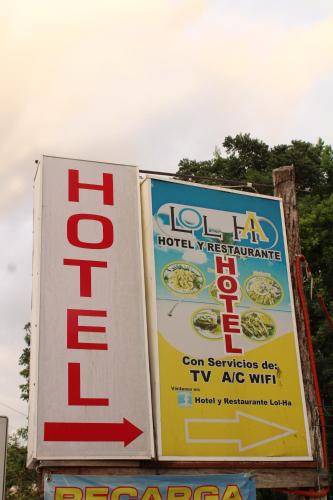 a sign for a hotel margarita at Hotel LOL-HA in Cobá