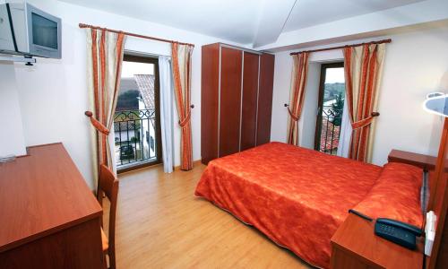 Postel nebo postele na pokoji v ubytování Hotel Agorreta