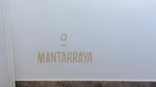 a sign for a marriott pharmacy on a building at The Mantarraya Outpost in La Paz