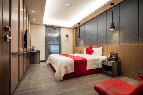 Postel nebo postele na pokoji v ubytování Jin Spa Resort Hotel