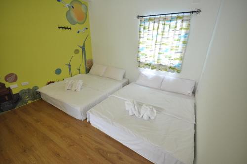 Postel nebo postele na pokoji v ubytování Hong Dao Min Su