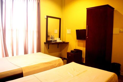 Postel nebo postele na pokoji v ubytování One C Hostel
