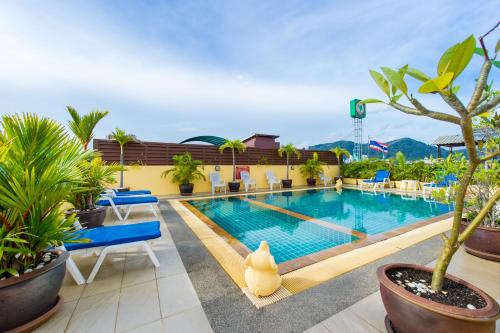 a swimming pool on the roof of a hotel at Thai Siam in Patong Beach