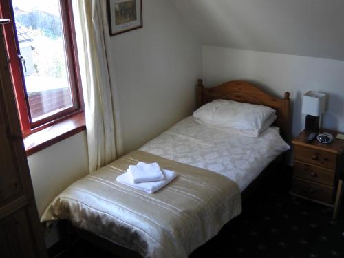 Кровать или кровати в номере Beeches Guest House