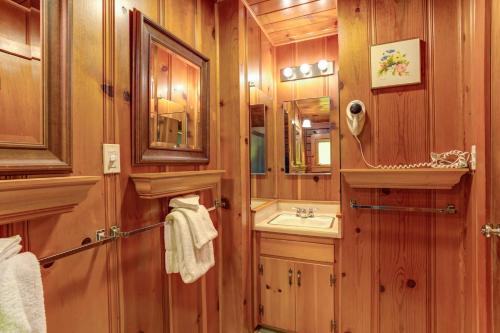 a bathroom with a sink and a mirror at 59 Hansen Cabin in North Wawona