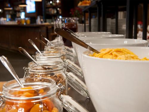 a buffet of food on a table in a restaurant at Stoten Ski Hotel in Stöten