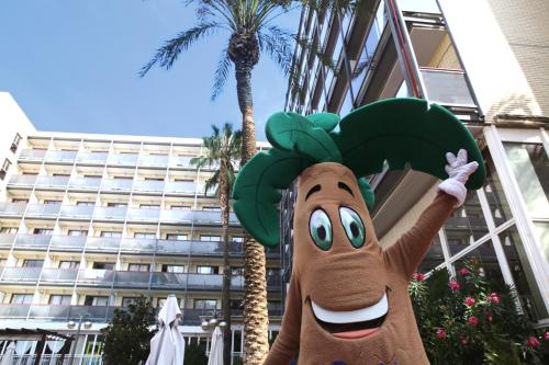a cartoon character is in front of a building at Eurosalou & Spa in Salou