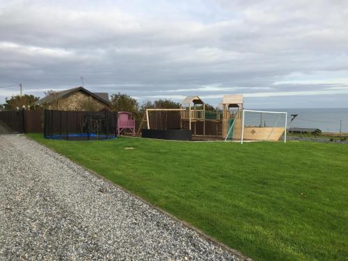 a park with a playground with at Ocean View,Kinsale, Hosted by Exquisite holiday homes, sleeps 22 in Kinsale