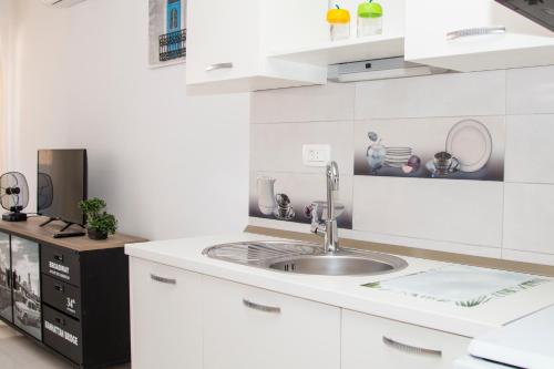 Køkken eller tekøkken på Your Vacation Apartment