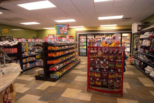 a grocery store aisle with products on display at Richmond North / Kings Dominion KOA in Doswell