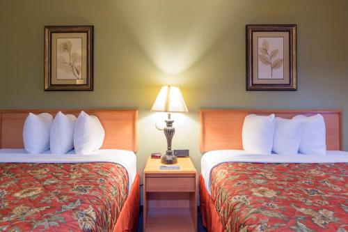 Katil atau katil-katil dalam bilik di Old Town Inn