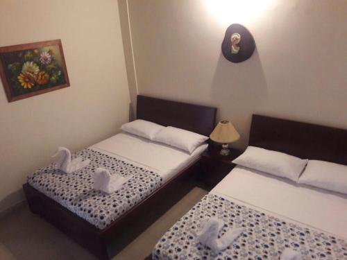 Кровать или кровати в номере Villa Angela