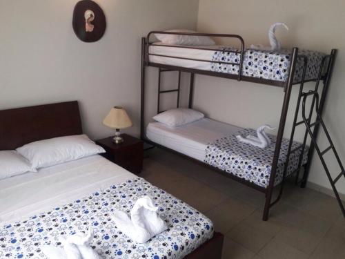 Кровать или кровати в номере Villa Angela