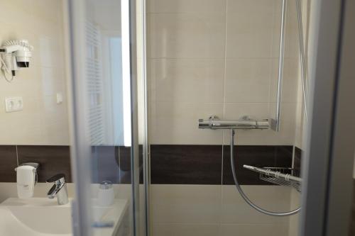 Koupelna v ubytování Hotel Stern