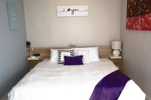 Posteľ alebo postele v izbe v ubytovaní HNM Homestay Mesahill Nilai KLIA