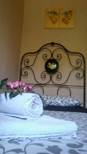 Postel nebo postele na pokoji v ubytování Agriturismo il Bacucco