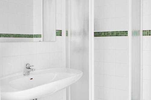 Kylpyhuone majoituspaikassa Comfort Hotel Jönköping