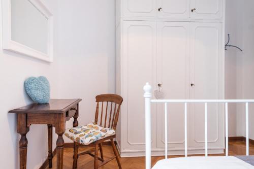 Ένα ή περισσότερα κρεβάτια σε δωμάτιο στο Rise and Smile Charming Penthouse