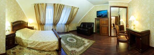 TV a/nebo společenská místnost v ubytování Hotel Helicopter