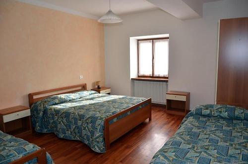 Cama o camas de una habitación en Casa Caritro
