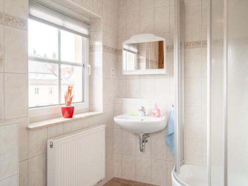 Ένα μπάνιο στο Ferienwohnung Knoth
