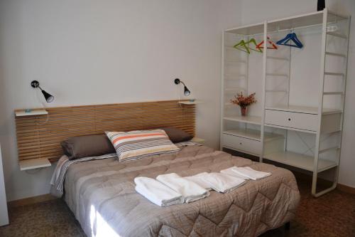 Postel nebo postele na pokoji v ubytování B&B CASA CRISTALLO