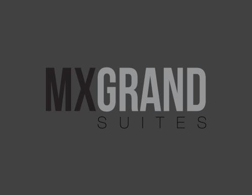 a sign that reads nx grand suites at MX Grand Suites in Mexico City
