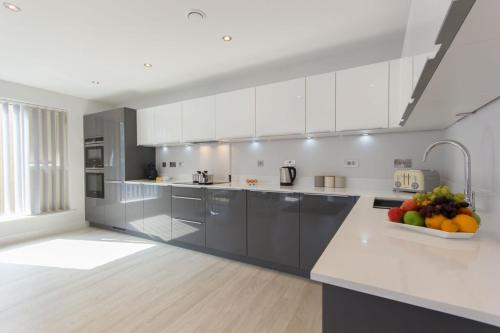 Kuchyň nebo kuchyňský kout v ubytování Citystay Living - Vesta Apartments