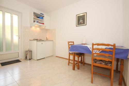 Kuchyň nebo kuchyňský kout v ubytování Apartments Beslema