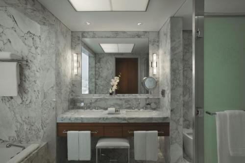 a bathroom with a sink and a mirror at Alvear Art Hotel in Buenos Aires