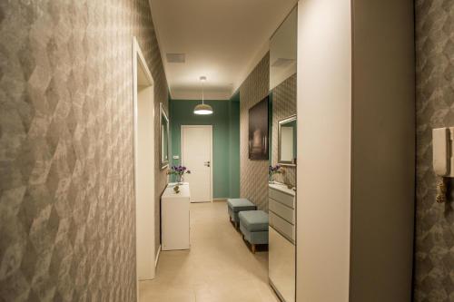 Koupelna v ubytování 3BDR City Center Ruterra Apartment