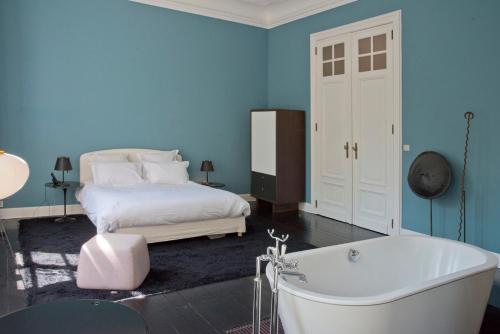 Ένα ή περισσότερα κρεβάτια σε δωμάτιο στο Appartement Chic