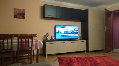 A television and/or entertainment center at Na Małej