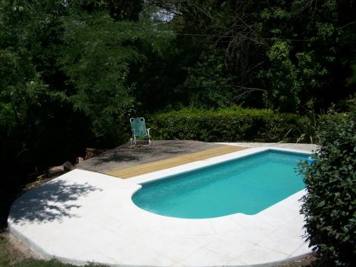 The swimming pool at or near Cabañas Ananda