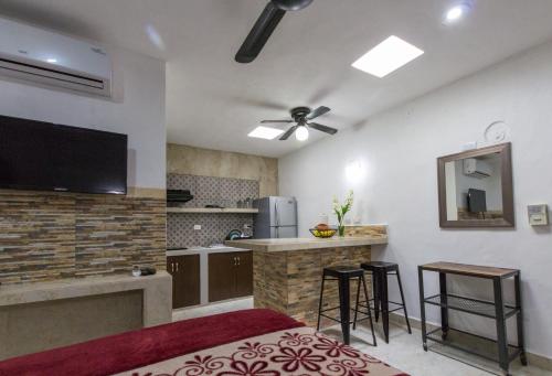 Η κουζίνα ή μικρή κουζίνα στο Merida Serviced Apartments