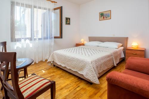 Apartment Oliveraにあるベッド