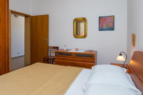 Apartment Oliveraにあるベッド