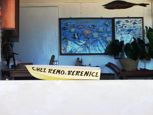 a surfboard sitting on a table in a room at Remo e Berenice in Nosy Komba