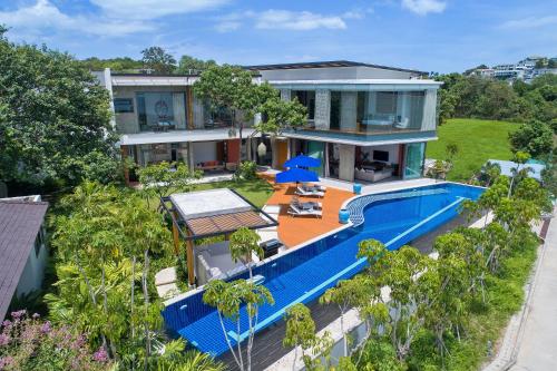 an aerial view of a house with a swimming pool at Villa Sea Senses in Choeng Mon Beach