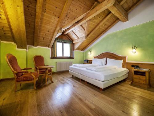Katil atau katil-katil dalam bilik di Hotel Bertelli
