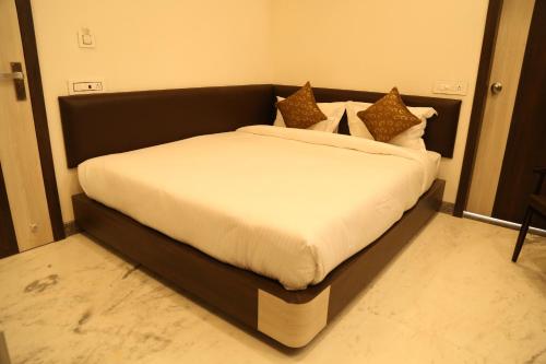 Hotel Delightにあるベッド