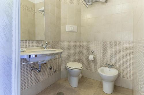 Koupelna v ubytování Albergo Carpino
