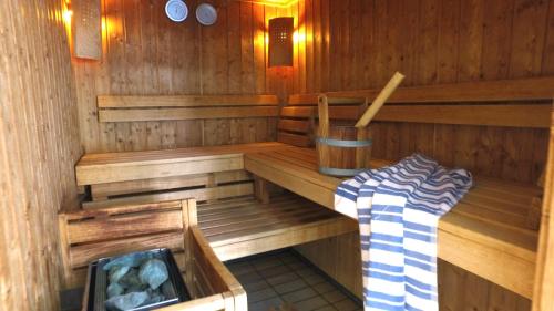 an inside of a sauna with a bench in it at VVF Alsace Orbey Colmar in Orbey
