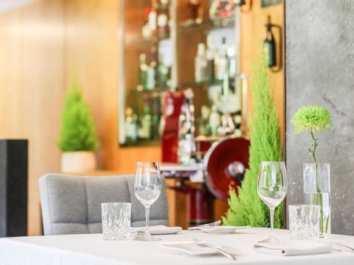 Restavracija oz. druge možnosti za prehrano v nastanitvi AlpenParks Hotel & Apartment Taxacher