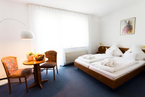 Lova arba lovos apgyvendinimo įstaigoje Hotel Roemerstein